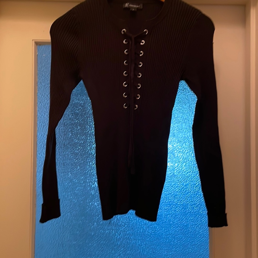 Black INC top with silver rings six small. Stretchy Worn once